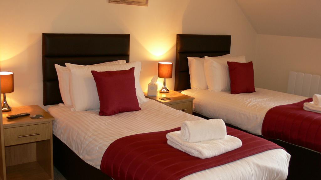 The Home Arms Guesthouse อายเมาธ์ ห้อง รูปภาพ